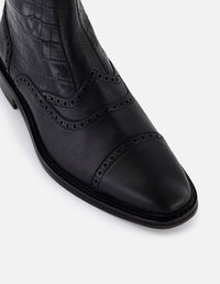 Botines negros en piel tipo coco para hombre con detalles en picado