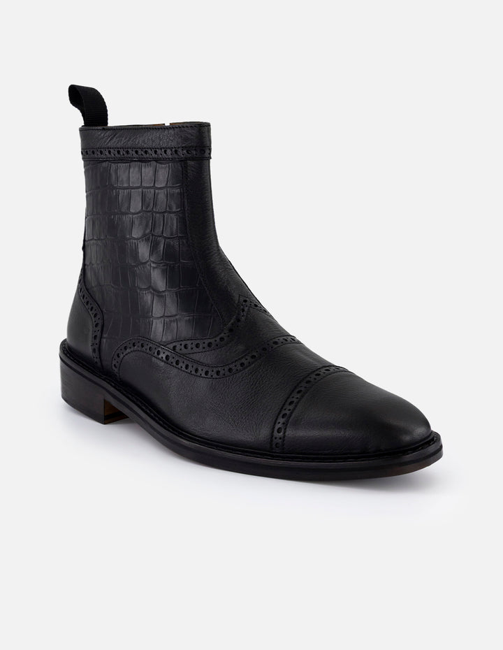 Botines negros en piel tipo coco para hombre con detalles en picado