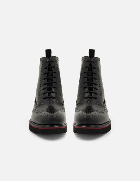 Botines negros de piel para hombre con acabado en alto brillo