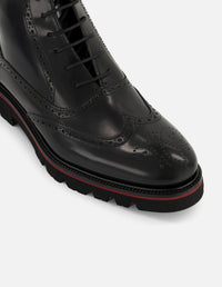 Botines negros de piel para hombre con acabado en alto brillo