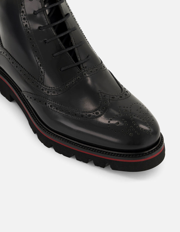 Botines negros de piel para hombre con acabado en alto brillo