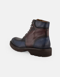 Botines vino piel para hombre con detalles en piel napa