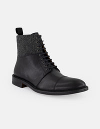 Botines negros piel y textil para hombre con caña tipo espiga