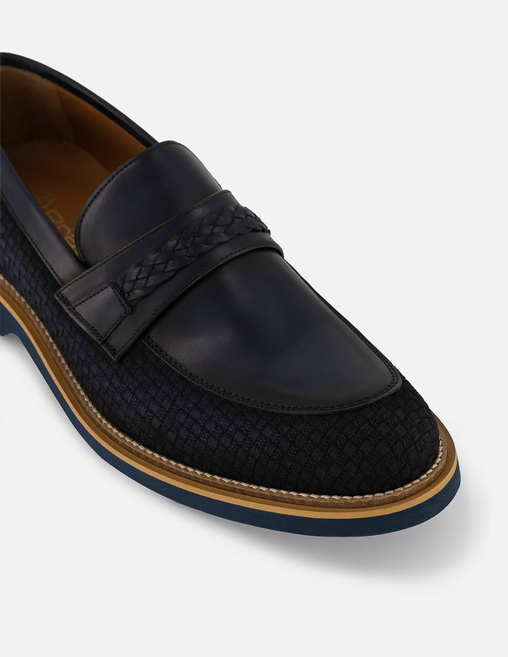Mocasines con combinación de piel y textil trenzado en color azul para hombre