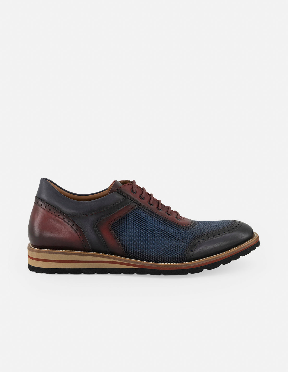 Zapato inglés con grabado tipo malla en piel color azul para hombre