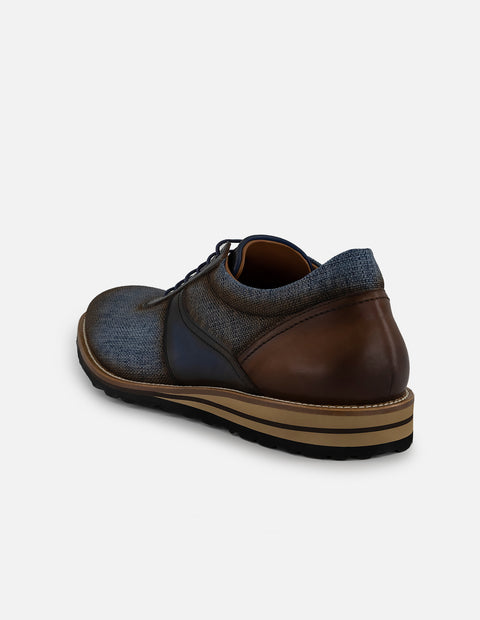 Zapato inglés en textil azul con combinación de materiales para hombre