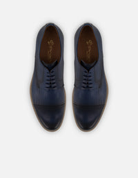 Zapato Blucher azul en piel grabada para hombre con acabado aerografiado