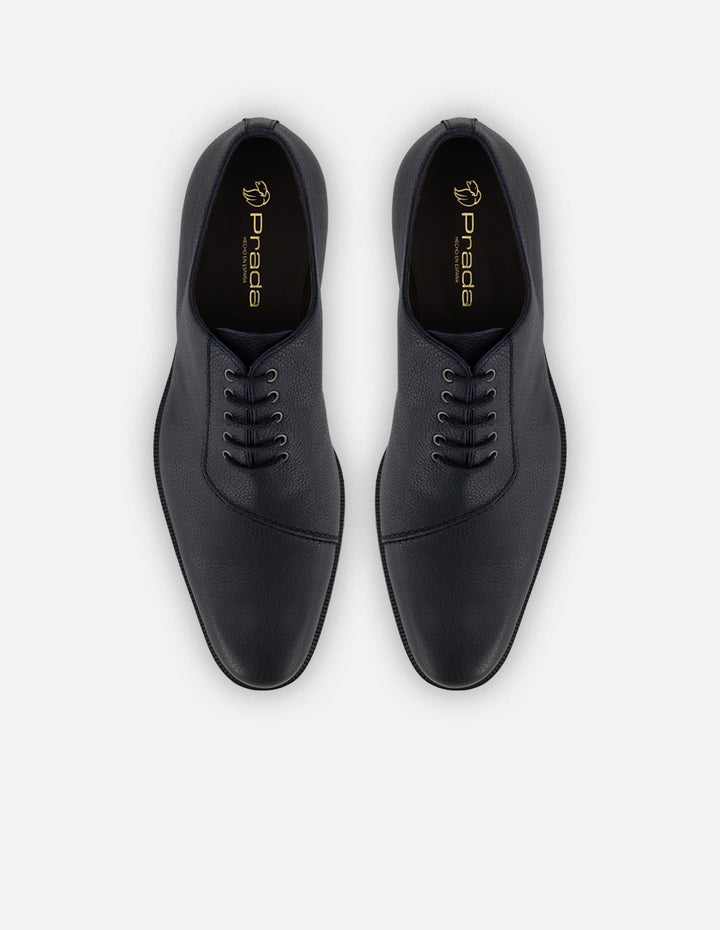Zapato Oxford azul piel para hombre con corte asimétrico