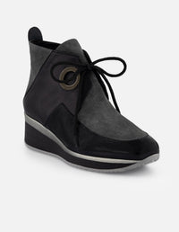 Botines negro ante charol para mujer con combinación de materiales