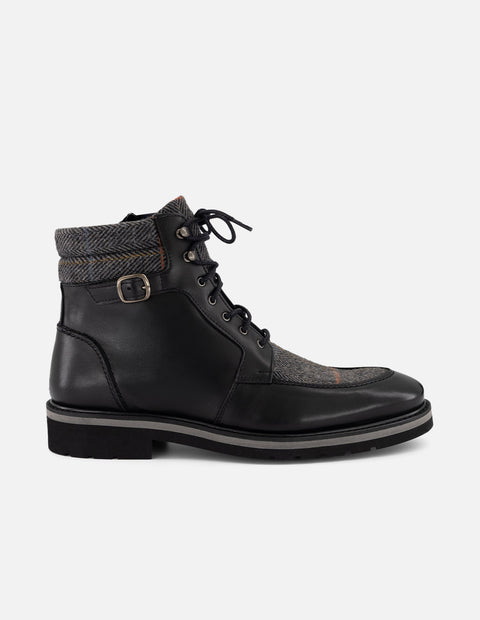 Botines negros piel y textil para hombre con hebilla lateral
