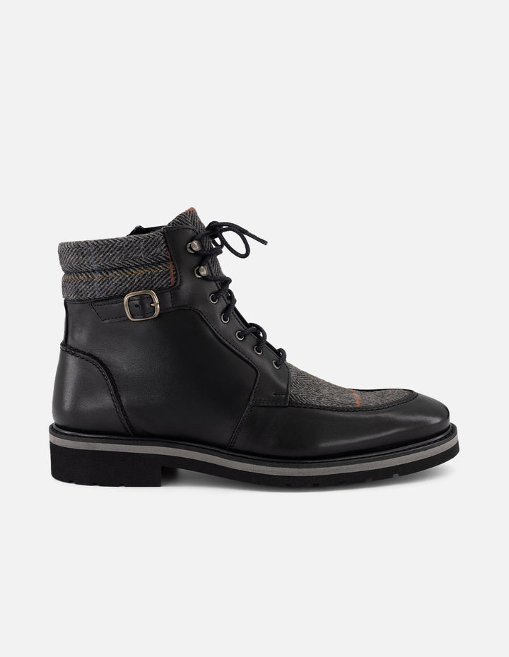 Botines negros piel y textil para hombre con hebilla lateral