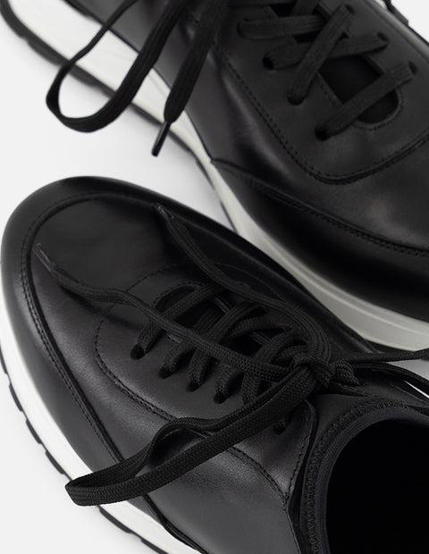Tenis negro piel para hombre con combinación de materiales