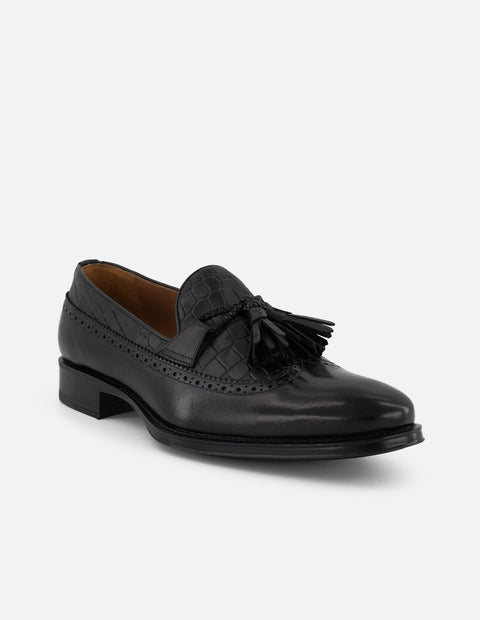 Mocasines negros piel tipo coco para hombre con borlas