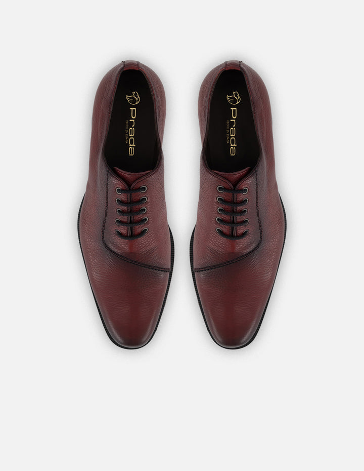 Zapato Oxford vino piel para hombre con corte asimétrico