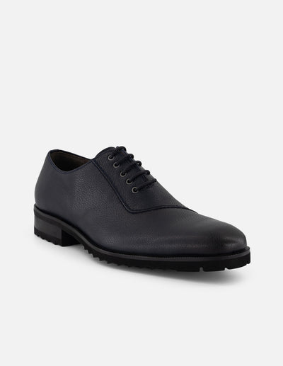 Zapato Oxford azul piel para hombre con corte asimétrico
