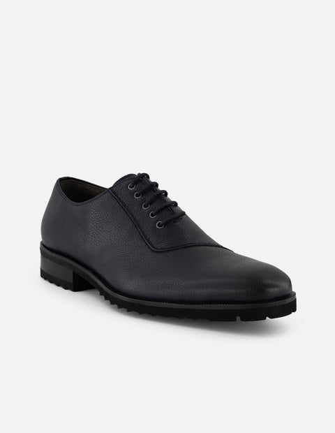 Zapato Oxford azul piel para hombre con corte asimétrico