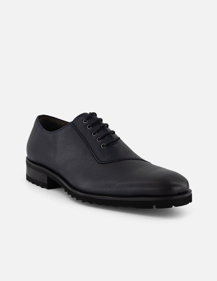 Zapato Oxford azul piel para hombre con corte asimétrico