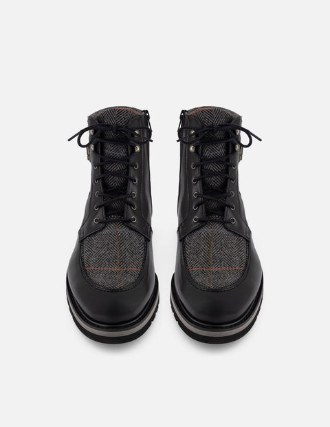 Botines negros piel y textil para hombre con hebilla lateral