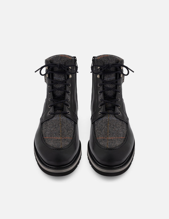 Botines negros piel y textil para hombre con hebilla lateral