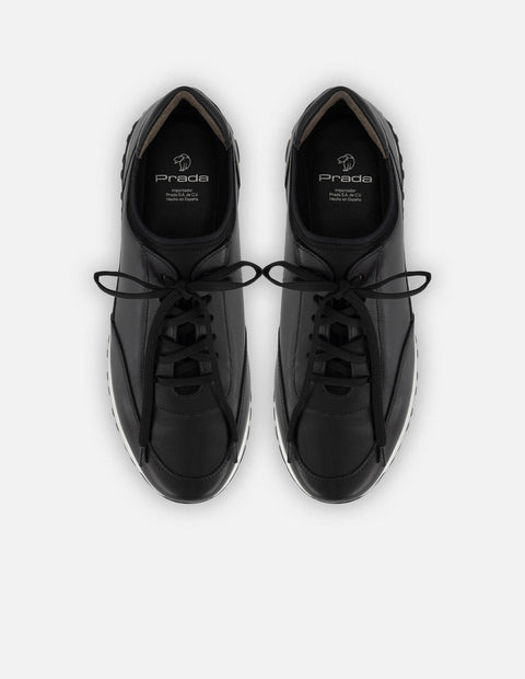 Tenis negro piel para hombre con combinación de materiales