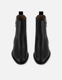 Botines negros de piel para mujer con corte asimétrico