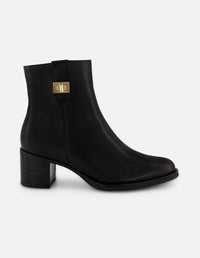 Botines negro piel para mujer con tira lateral