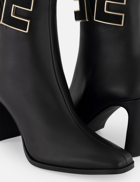 Botines negro piel para mujer con herrajes en pelo