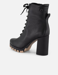 Botines negros piel bombeada para mujer con suela track