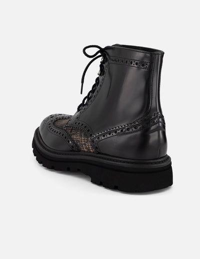 Bota negra piel y textil para hombre con combinación de materiales