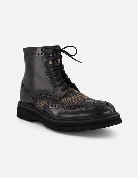 Bota negra piel y textil para hombre con combinación de materiales
