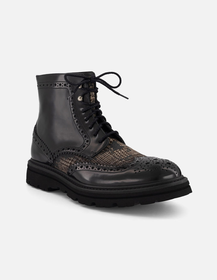 Bota negra piel y textil para hombre con combinación de materiales